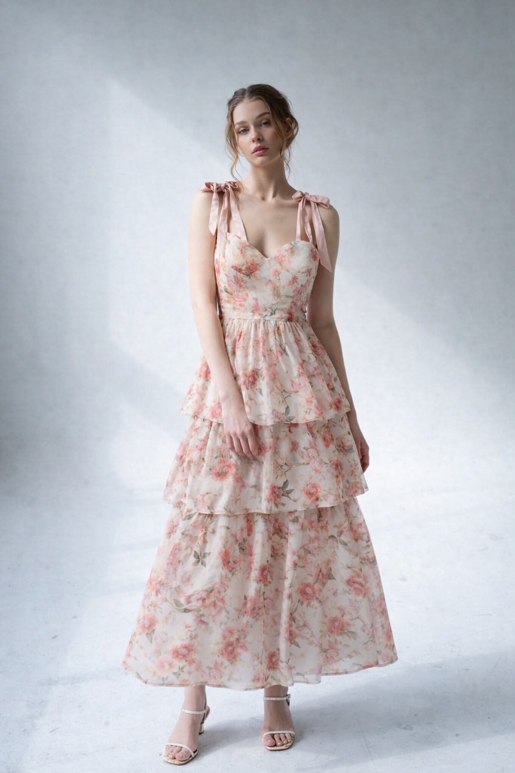 Full-length Pastel Corset Maxi Dress in blush floral print with tiered skirt and sweetheart neckline