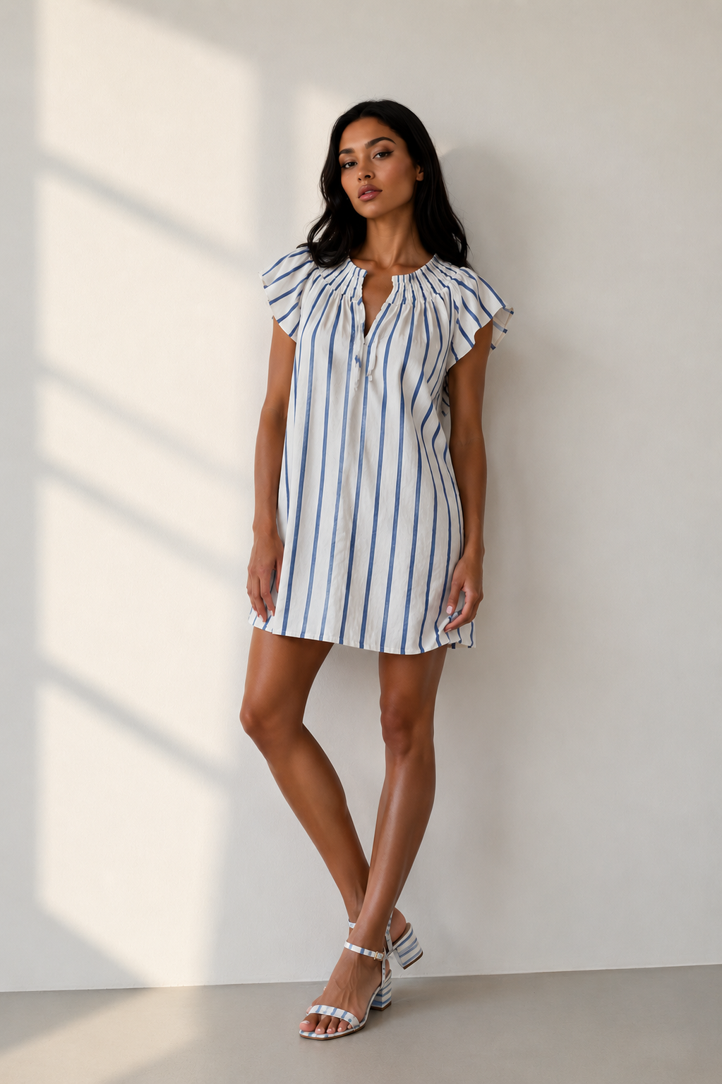 Shop the DayTrip Stripe mini dress at Madison Ave Boutique. A flattering blue and white striped summer dress by Sadie & Sage featuring a breezy, trendy fit.